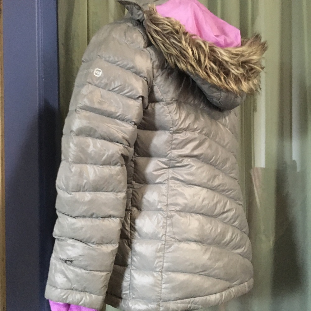 This coat has been worn very little.  Warm n cute